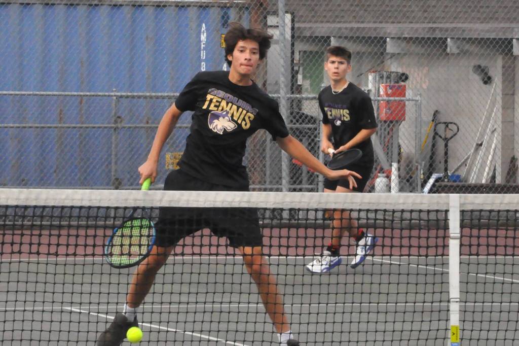 Sequim Gazette photo by Matthew Nash
Doubles team Sebastian Buhrer and Tegan Kurtze score a point against their North Mason opponents on Oct. 2. The duo won 6-4, 7-5.