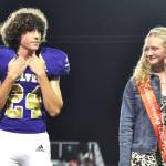 Sequim Gazette photo by Matthew Nash/ Freshmen Silas Hagar and Kendall Adolphe stand together as theyre announced to the crowd at the Homecoming game on Oct. 3 as their class representatives on the annual events royalty court.