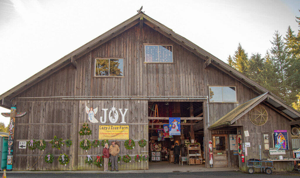 Sequim Gazette file photo by Emily Matthiessen/
Pictured in December 2024, Ann and Steve Johnson stand outside the Christmas Barn at Lazy J Tree Farm on the cusp of their busiest weekend of the U-Cut season. Johnson has spent his whole life on the farm, which has become a seasonal destination for local families for the last forty years. Former Gazette reporter Emily Matthiessen won Third Place, Business Feature Story, Group 2 in the Washington Newspaper Publisher Associations 2025 Better Newspaper Contest.