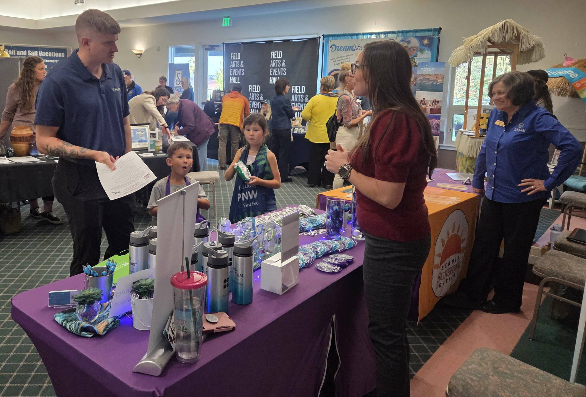 Photo by Beth Pratt
The table for Business Health Trust was manned and well-stocked as the 17th Annual Business Showcase got underway on Tuesday, Oct. 7. The company was a Lavender sponsor of the event.