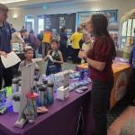 Photo by Beth Pratt
The table for Business Health Trust was manned and well-stocked as the 17th Annual Business Showcase got underway on Tuesday, Oct. 7. The company was a Lavender sponsor of the event.