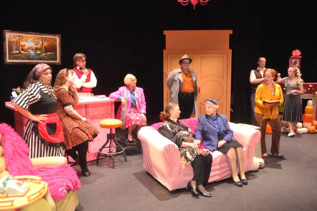 Sequim Gazette photo by Matthew Nash
To keep people guessing in OTAs adaptation of Agatha Christies A Murder is Announced, Susan DelaBarre, who plays Miss Marple in front right on the couch, said the story gives you only snippets of clues as attention shifts between characters.