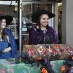 Sequim Gazette photo by Matthew Nash/
Rachel Campbell and Miliah Williams with Prima Materia hand out candy to hundreds of children on Halloween in downtown Sequim in 2024. Sequim merchants host trick-or-treating at many stores across Washington Street on Halloween from 3-5 p.m.