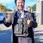 Photo courtesy Rachel Anderson/ Satoshi Ishihara with the Shiso City Planning and Coordination Department tours the Sequim Police Department during his recent visit to Sequim as a delegate for the Sequim-Shiso Sister City Association.