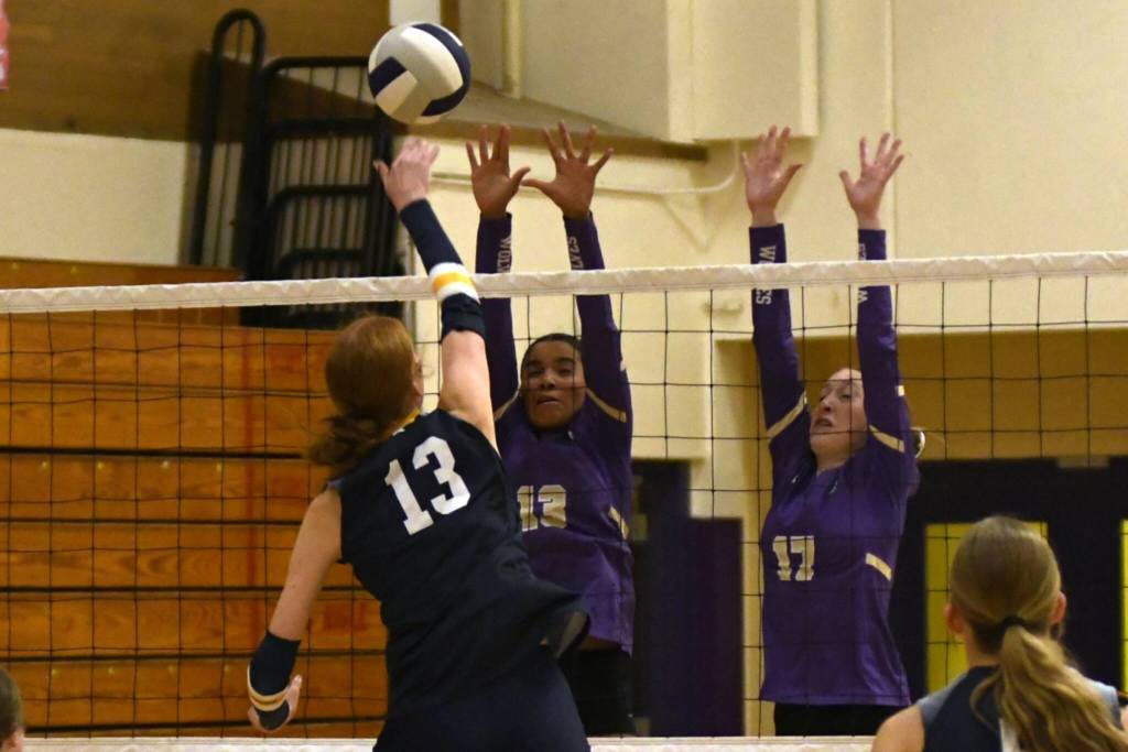 Sequim Gazette photo by Jacques Star
The Wolves Jordyn Julmist and Teagan Neathery look to make a block against a Bainbridge tip on Oct. 14.