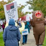Sequim Gazette photo by Jacques Star/
Many of those who participated in the No Kings II demonstration on Saturday, Oct. 18 carried signs. Some even wore costumes.