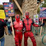 Sequim Gazette photo by Jacques Star/
A couple of Deadpools join the No Kings II demonstration on Saturday.