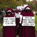 Photo courtesy John Gussman/
Some participants in the No Kings II protest in Sequim wore Handmaids Tale costumes to draw attention to threats against womens rights.