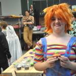 Sequim Gazette photo by Matthew Nash/
Mackenzie Erks, 10, dressed as Chucky from Childs Play, shows the cupcake she won during the Cake Walk at the Halloween Bash inside the Boys & Girls Club.
