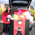 Photo by Monica Berkseth
Allie Gale stands by her bubblegum booth during Sequim Community Churchs Fall Family Festival.