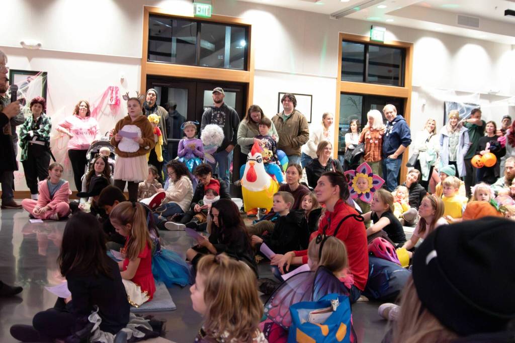 Photo by Monica Berkseth/
Families gather for a presentation during the Dungeness River Nature Centers Not-So-Scary Halloween event on Oct. 24.