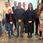 Photo courtesy Megan Lyke
Nicholas Bell, center, stands with Sequim School District administrators, board directors, student liaisons, and Judge Elizabeth Stanley after he was sworn in by her as the newest board director on Nov. 3.