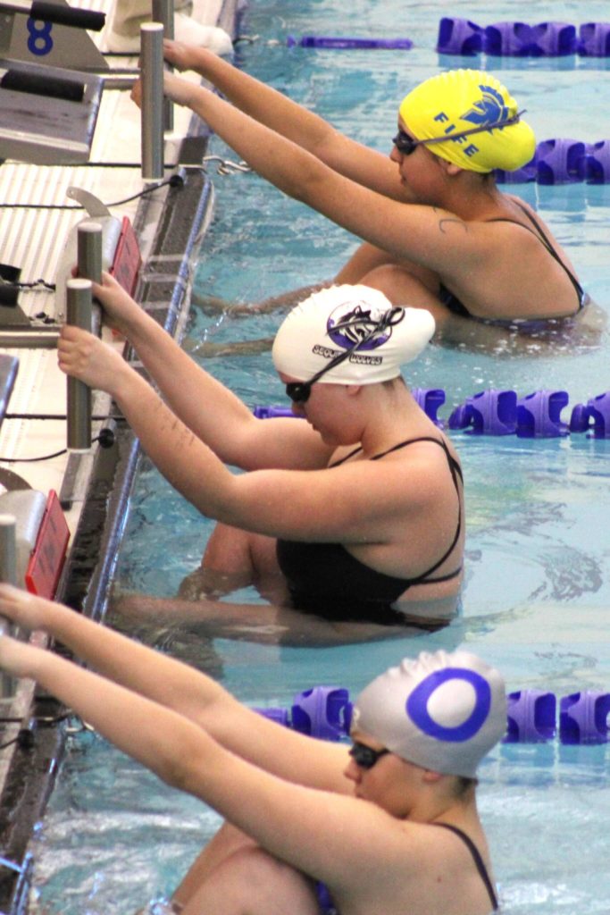 Photo courtesy Eric Ellefson/
Naomi Beglyakov readies herself before the start of the 200-yard medley relay. She and Annie Ellefson, Ava Shinkle and Holland Sol earned a qualifying place at the 2A state meet this weekend.