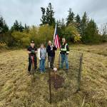 Photo courtesy Judy Tordini/ Those present for the ceremonial planting included, from left, Kevin ONeill, commander, Sequim VFW Post #4760; Nancy Zimmerman, chaplain, Michael Trebert DAR and commander, American Legion Post #62; John Kowalski, senior vice president, Sequim VFW; and Gary Butler of the citys Parks Department.