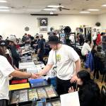 Sequim Gazette photos by Matthew Nash
Visitors buy and trade cards with vendors at the Card and Pokémon Show on Nov. 8 inside the Sequim Elks Lodge.