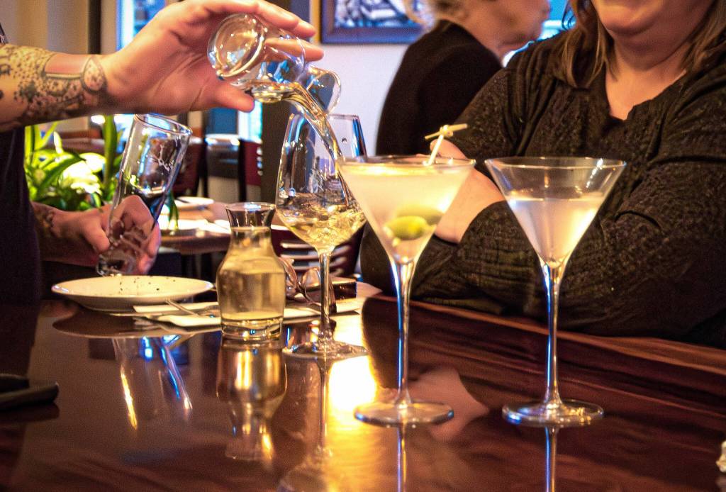 Sequim Gazette photos by Monica Berkseth
Bartender Dan Owens pours drinks for two customers on a recent Tuesday evening.