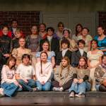 The cast and crew of the Sequim High School production of Pride and Prejudice gather for a group photo.