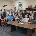 Photo courtesy Sequim-Dungeness Valley Chamber of Commerce/ KSQM 91.5 FM Radio won the honor of chamber Member of the Month for October for the stations service to the community. The award was presented in the radio stations Community Room, which was a packed with volunteers, staff, chamber board members and allies.