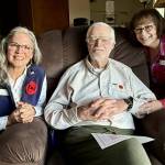 Photo courtesy New Dungeness Chapter DAR/ Mona Kinder, Jack Vogt, USMC, and Anita Reynolds commemorate their Nov. 8 visit with a photo. The women, along with eight other members of the New Dungeness Chapter NSDAR, visited three area senior housing facilities to show veterans that they are not forgotten.