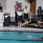 Photo courtesy of Eric Ellefson/
Naomi Beglyakov tags the wall as Annie Ellefson takes off in the 200 IM relay. They and Ava Shinkle and Holland Sol finished 18th in state.
