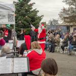 Sequim Gazette photo by Emily Matthiessen
Santa shows off his conducting skills by leading the Sequim City Band at 2024s Hometown Holidays event.