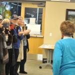 Sequim Gazette photo by Matthew Nash/
Friends and audience members of the Sequim City Council Nov. 10 meeting applaud Emily Westcott for her service to the city with Christmas decorations, flower baskets, and beautification efforts.
