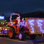 Sequim Gazette photo by Monica Berkseth/ The Lighted Tractor Parade in downtown Sequim has long been a popular tradition, closing out the Hometown Holidays event organized by the chamber, Sequim Museum and Arts volunteers and many others. Organizers said nearly 40 tractors participated this year.
