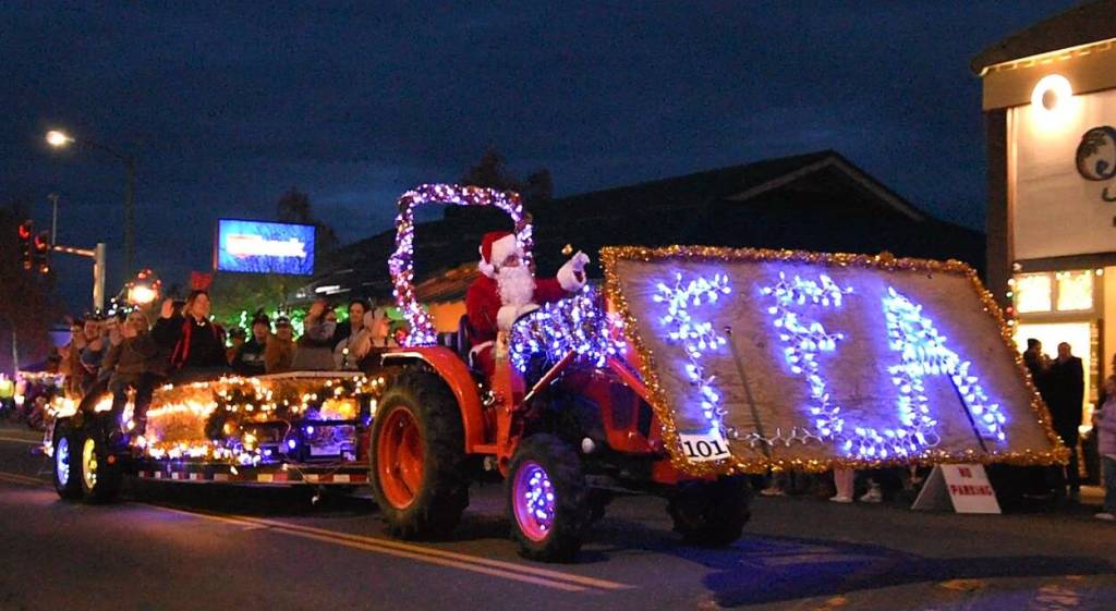 Sequim Gazette photo by Monica Berkseth/ The Lighted Tractor Parade in downtown Sequim has long been a popular tradition, closing out the Hometown Holidays event organized by the chamber, Sequim Museum and Arts volunteers and many others. Organizers said nearly 40 tractors participated this year.