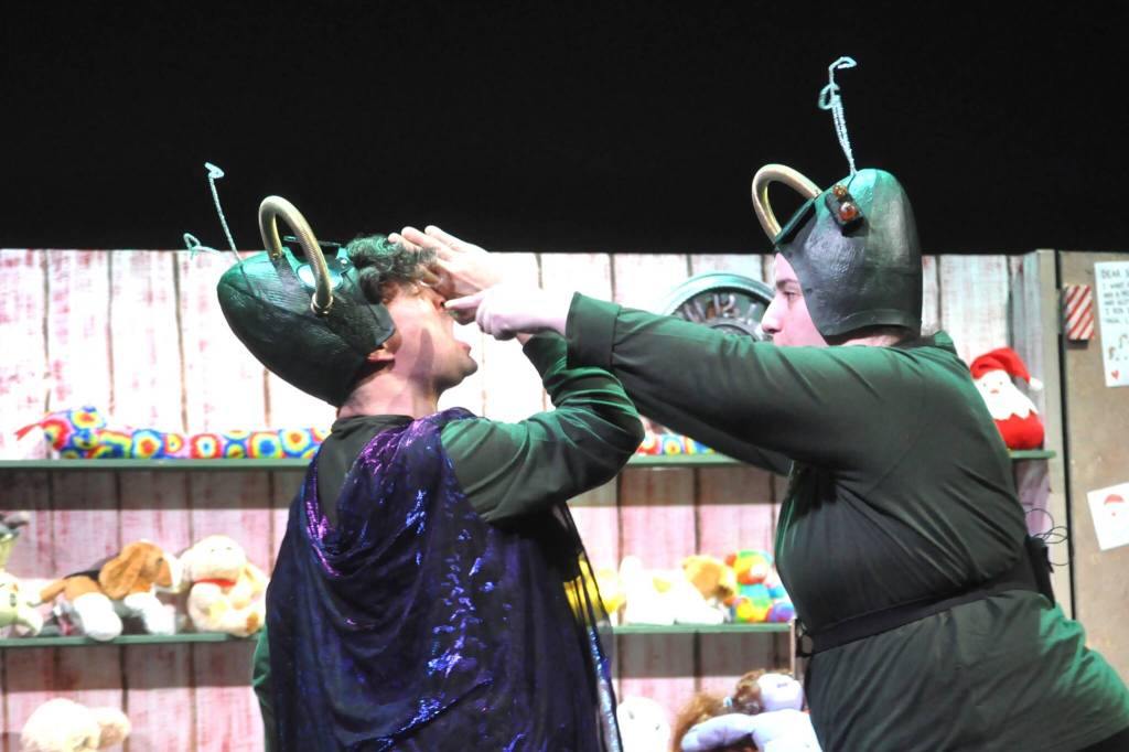 Sequim Gazette photo by Matthew Nash/
Martians Kimar (Colby Thomas) and Voldar (Ginny Holladay) channel their inner Three Stooges for a scene in Santa Claus conquers the Martians at Olympic Theatre Arts.