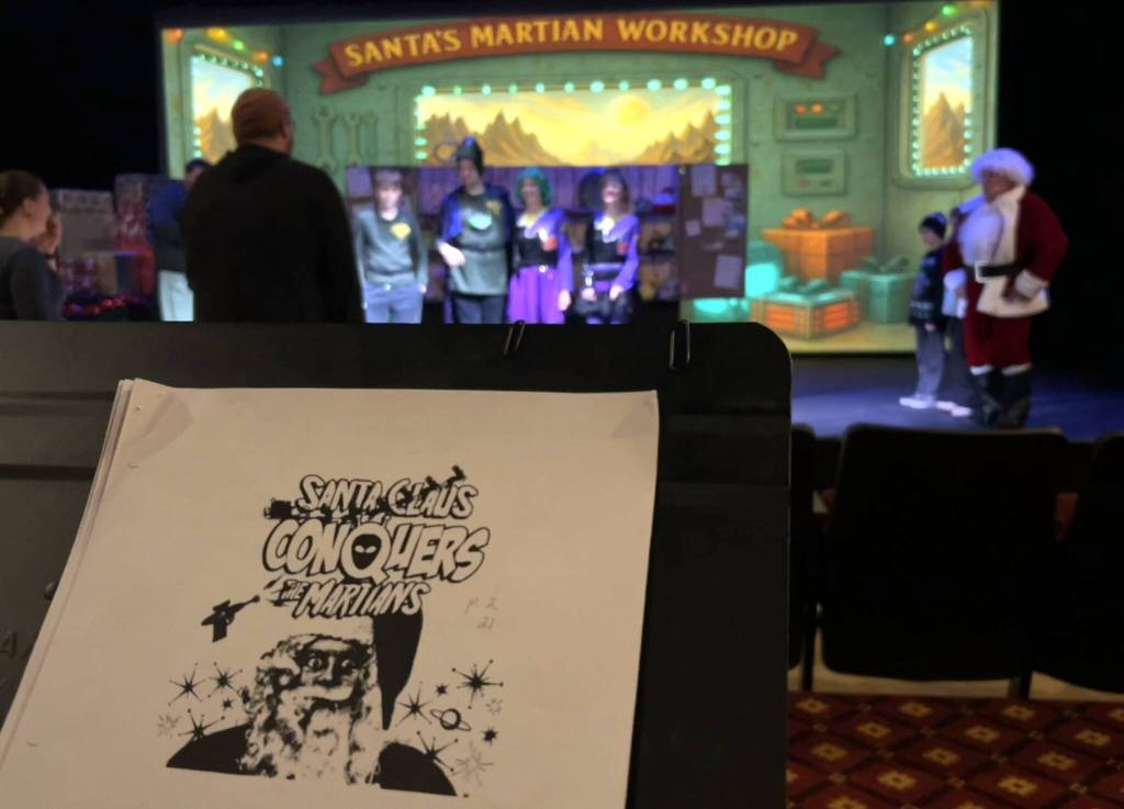 Sequim Gazette photo by Matthew Nash/
Actors and directors prepare the last scene in Santa Claus conquers the Martians at a recent rehearsal.