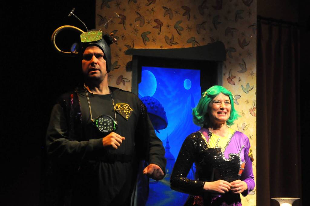 Sequim Gazette photo by Matthew Nash/
Kimar and Momar (Colby Thomas and Rebecca Maberry) consider the best way to help their Martian children go back to their usual ways after watching too much Earth television.