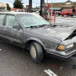 Sequim Gazette photo by Matthew Nash/ No injuries were reported after a car fire at the Sequim Safeway fuel station on Dec. 10.