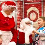 Sequim Gazette photos by Monica Berkseth
Santa and Mrs. Claus, who happen to be close friends with Marty and Michelle Bingham of Sequim, listen carefully to the Christmas wishes of Tanner Deemer, 7, during the Breakfast with Santa event hosted by The Church of Jesus Christ of Latter-Day Saints on Saturday, Dec. 13.<font face="Courier New, Courier, monospace" size="3">
</font>