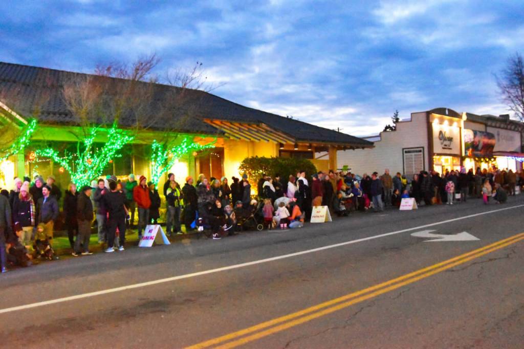 Sequim Gazette photo by Monica Berkseth/ Crowds gather in anticipation of the Lighted Tractor Parade as part of Sequims Hometown Holidays event.
