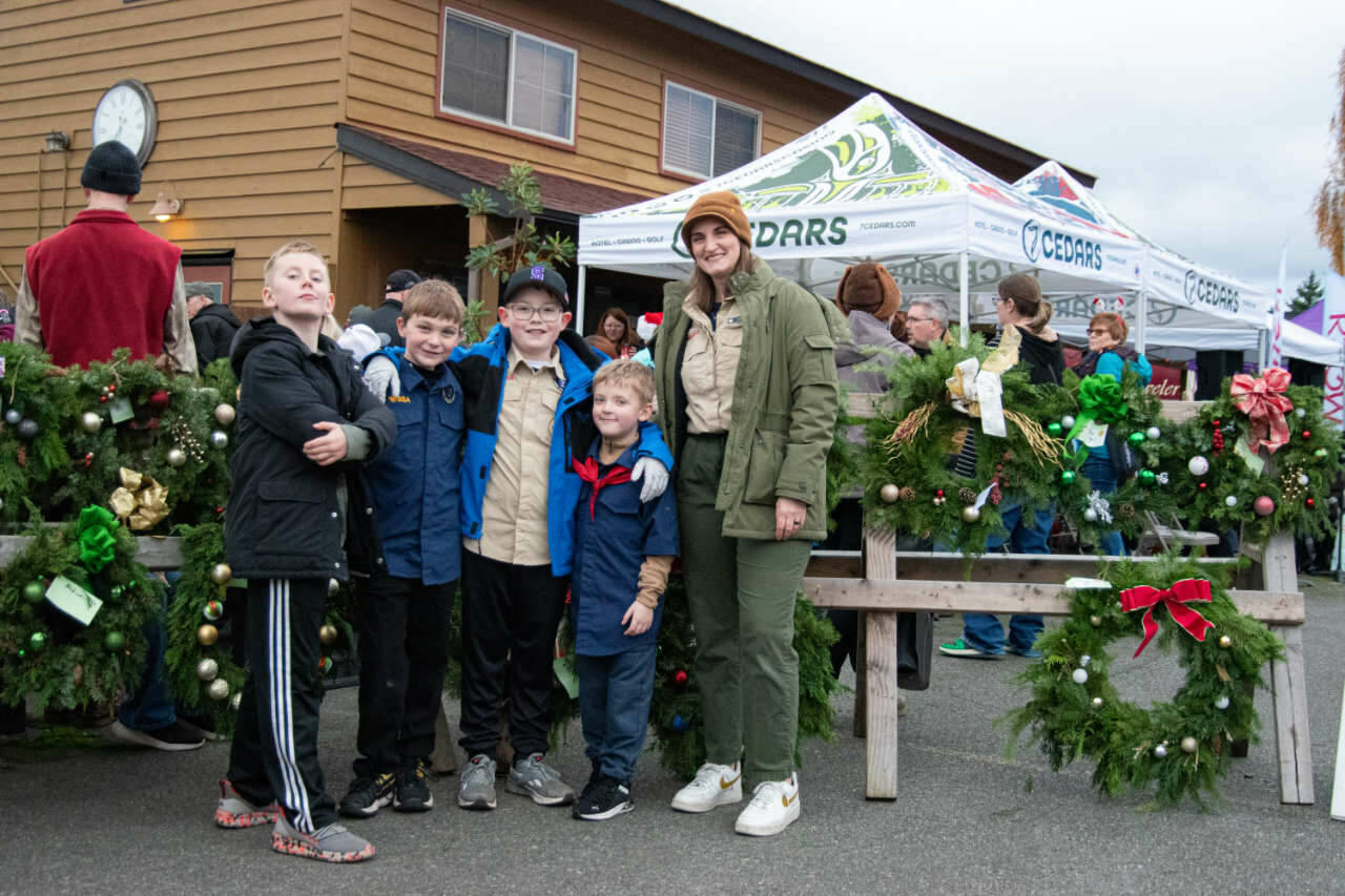 Sequim Gazette photo by Monica Berkseth/ Members of Cub Scout Pack 4490 show off their handmade wreaths.