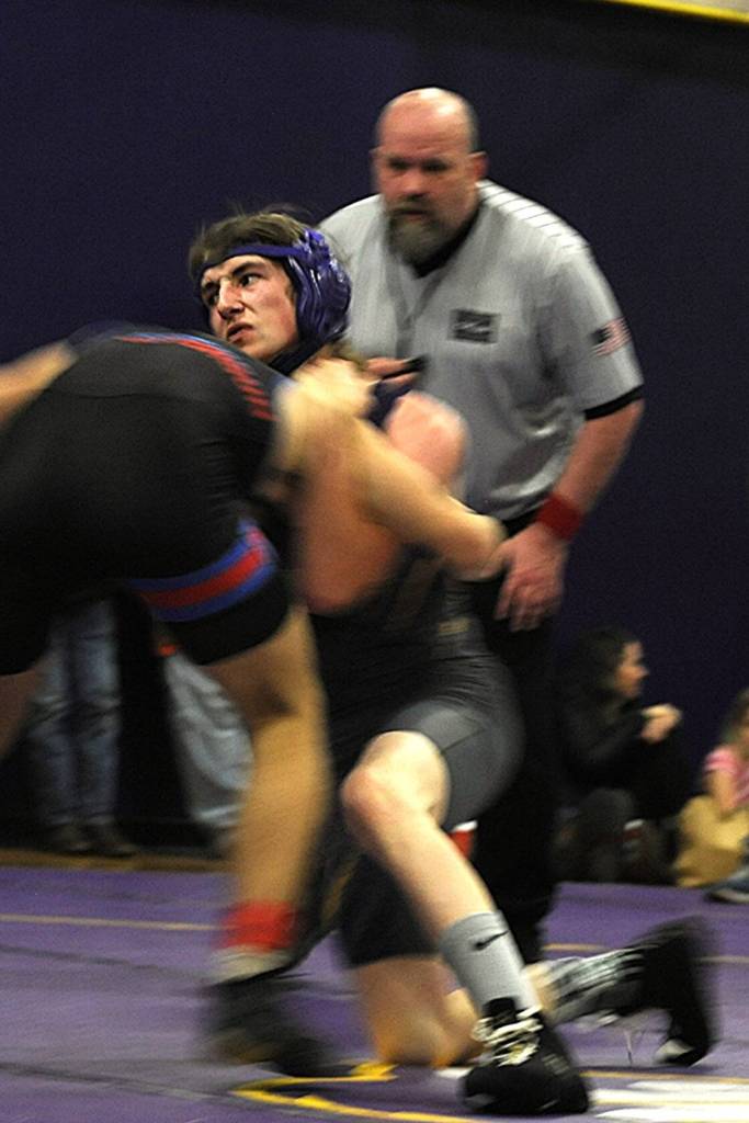 Sequim Gazette photo by Matthew Nash/
Levi Breithaupt wrestles in an exhibition match on Dec. 11.