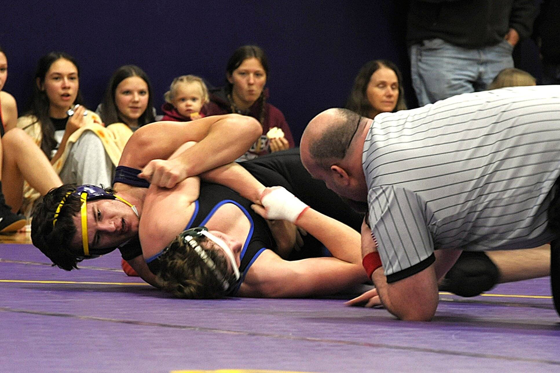 Sequim Gazette photo by Matthew Nash
Aiden Glenn wins an opening exhibition match against an East Jefferson wrestler on Dec. 11 in Sequim.