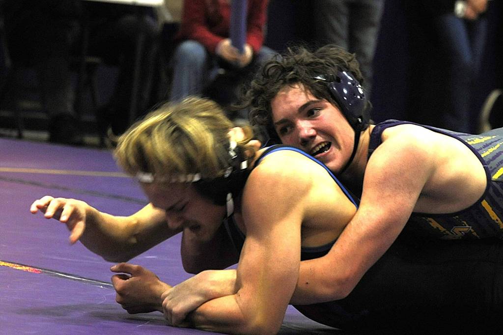 Sequim Gazette photo by Matthew Nash/
Ryan Spelker with Sequim wins by technical fall 21-6 against East Jeffersons Zeke Banks on Dec. 11 in the 138-pound varsity matchup.