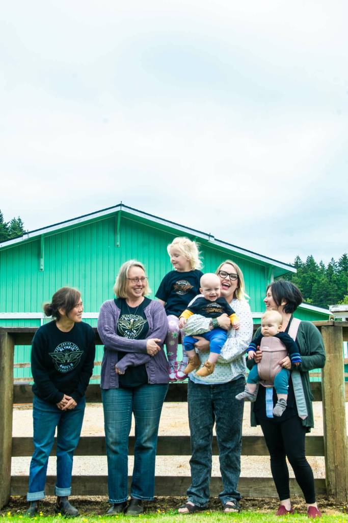 Photo courtesy by Teren Oddo/ At Olympic Angels, its all about family. Shown here from left to right are: Hanako Myers, case manager; Kathy Zelenka, case manager; Kylie Douglas with her daughter Stevie Douglas and baby son Killian Douglas; and board advisor Julia Guarino with her baby, Juniper.