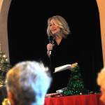 Sequim Gazette photo by Matthew Nash
Sandra Berryhill-Huish, vice-president of the Sequim-Dungeness Hospital Guild, emcees the groups annual volunteer appreciation event at Olympic Theatre Arts on Dec. 12. The all-volunteer group has given more than $2.5 million to medical and emergency efforts in the Sequim area.