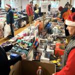 Sequim Gazette photos by Matthew Nash
For the fourth year, Nancy and Ivor Garbush volunteer at Toys for Sequim Kids looking to help families find the right gifts for their children. Giving out toys to kids, you cant beat that! Nancy said.