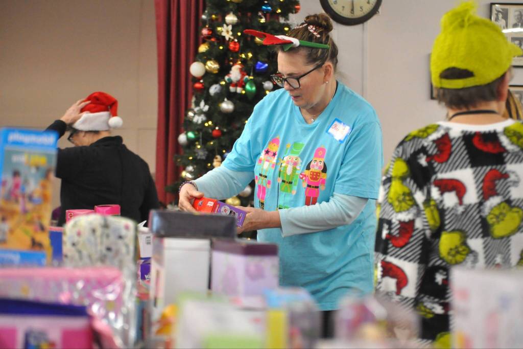 Sequim Gazette photo by Matthew Nash/
Charlie Buckley of Sequim volunteers at Toys for Sequim Kids for the second year.