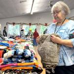 Sequim Gazette photo by Matthew Nash/
Linda DeMoss, organizer of quilt donations for Toys for Sequim Kids, said quilt and blanket donations were down this year due to the economy, costs, and the closing of Jo-Anns in Port Angeles, which impacted volunteers who make the quilts. They remain a hit though as families love the quilts, she said.
