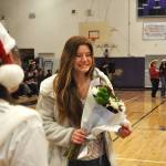 Kristine Prorok is thrilled to receive flowers as a gift through the ASB Leadership class at Winter Wishes.