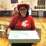 Kate Brouillard, a senior, said she was surprised to receive a laptop as a gift at the Winter Wishes assembly. She plans to attend Washington State University for a biology degree while pursuing a career in medicine.