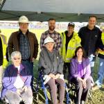 Sequim Gazette photos by Matthew Nash
Stakeholders involved in construction work related to The Ramponi Center for Technical Excellence come together on Dec. 15 to meet donor Marylaura Ramponi, second from bottom left, on Hendrickson Field. Those at the meeting were, from top left, Karen Wood, associate principal with Mahlum Architects; Chris Marfori, senior project manager for The Wenaha Group; Neil Colombini, project manager with Wenaha; John Greenleaf with Jamestown Excavating; Sam Hyatt, project manager with Wenaha; Mike Santos, Sequim School Districts facilities director; bottom left, Jan Olts, retired Sequim teacher and friend of Ramponi; and Sequim Superintendent Regan Nickels.