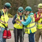 Photo courtesy Jolene Sanborn
Members of the Citizens Emergency Response Team (C.E.R.T.) confer about a training exercise.