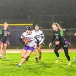 Photos by Emily Matthiessen
Sequims Stella Dennis runs with the ball during a wet and windy game against Port Angeles on Dec. 18. The Wolves won 37-6.