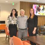 Sequim Gazette photo by Matthew Nash
Leaders with Holiday Inn Express & Suites, from left, Namaste Stayton, vice-president of hotel operations, Bret Wirta, owner, and Shelby Schleve, general manager, stand in The Great Room of the hotel. It was part of a massive, approximate $4 million remodel of the hotel that finished in August with opening up this space, refreshing hotel rooms and suites, and adding new amenities throughout the building.