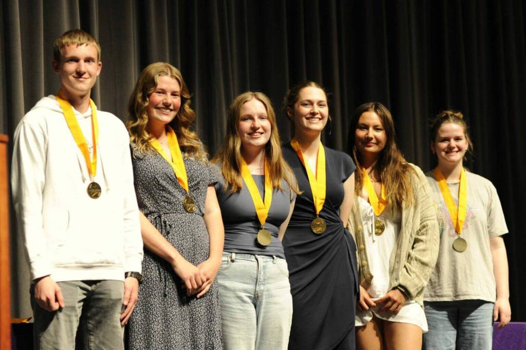 Sequim Gazette photo by Matthew Nash
Pictured at the Scholarship and Honor Awards Night on May 28, are seniors, from left, Jack Crecelius (Central Washington University), Skylar Krzyworz (Pacific Lutheran University), Keira Morey (University of Idaho), Libby Turella (University of Oregon), Melia Nelson (University of Washington) and Jovi Weller (Brigham Young University). They maintained a 4.0 grade point average through high school and they are six of 175 seniors that graduated on June 6.